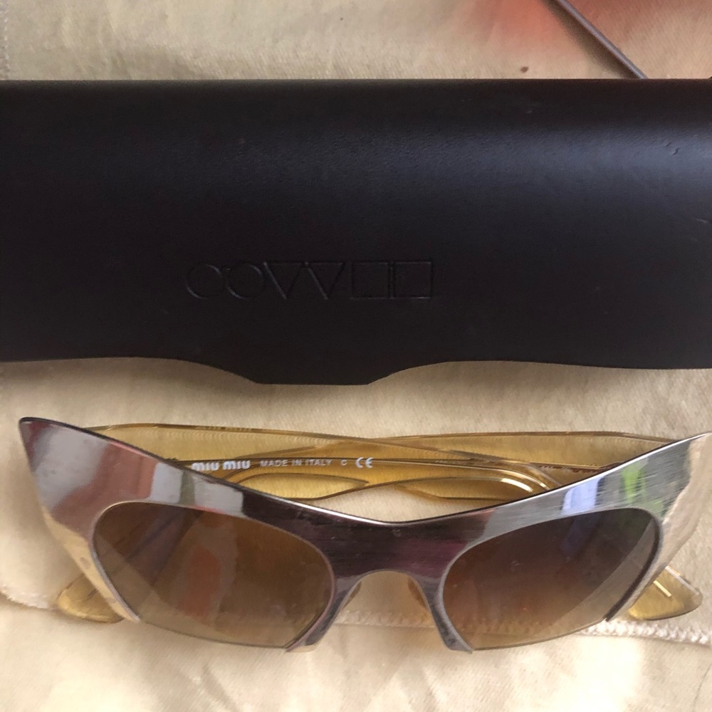 Gold Miu Miu CAT SHAPED SUN GLASSES